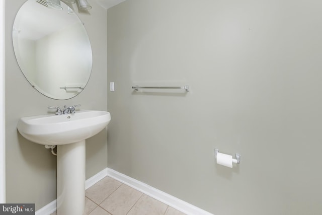 bathroom with tile patterned flooring