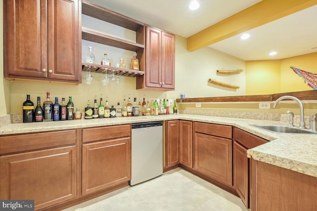 bar with sink, beam ceiling, and dishwasher