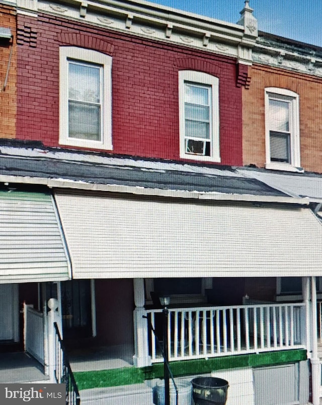 view of front of property with brick siding