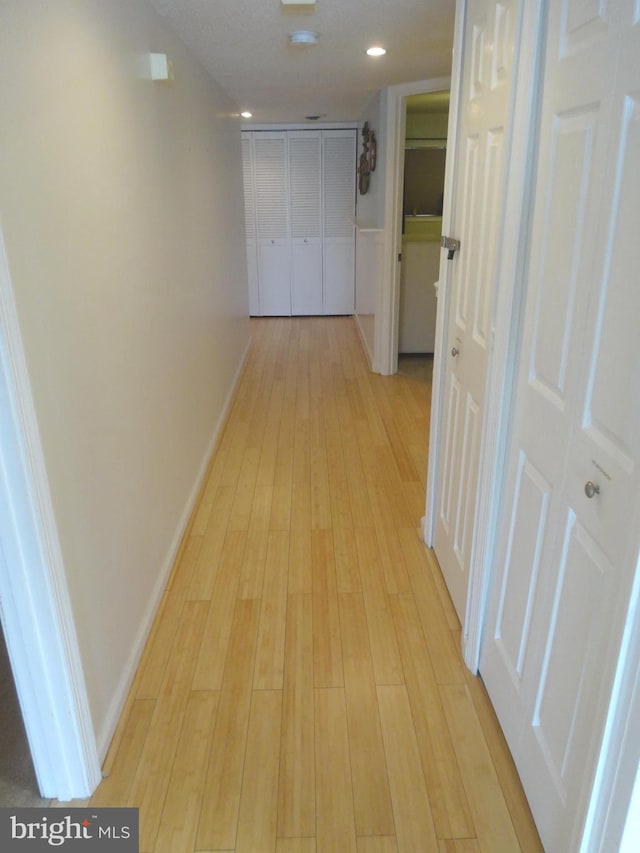 hall featuring light hardwood / wood-style flooring