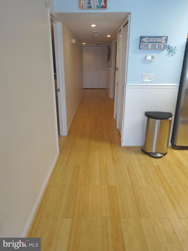 hall featuring light hardwood / wood-style flooring