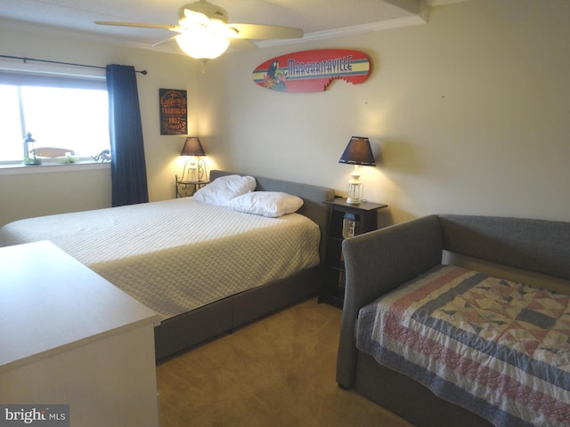 bedroom with ceiling fan and carpet flooring