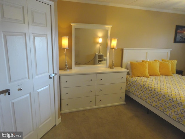 bedroom with carpet floors and ornamental molding