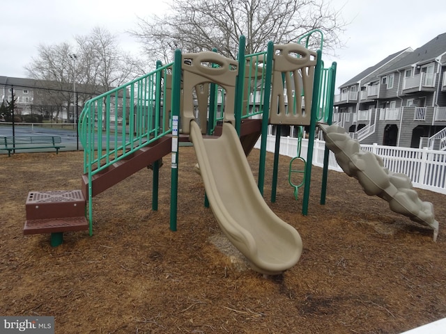 view of playground with tennis court