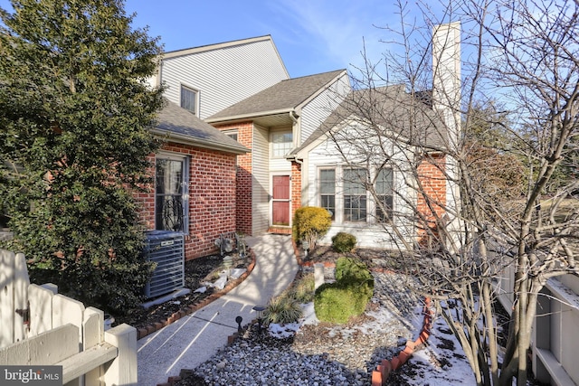 view of front of home with central AC unit