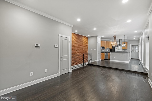 interior space featuring dark wood finished floors, crown molding, and a notable chandelier