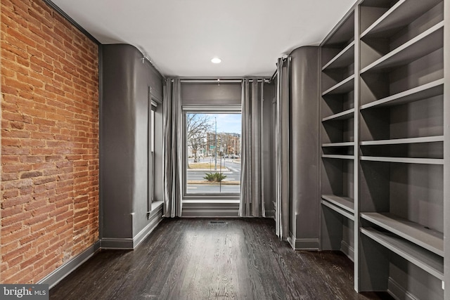 interior space with dark wood-type flooring