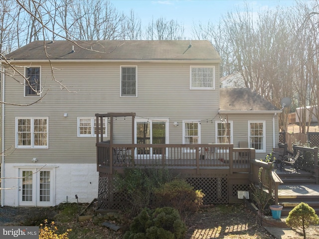 back of house with a pergola and a wooden deck