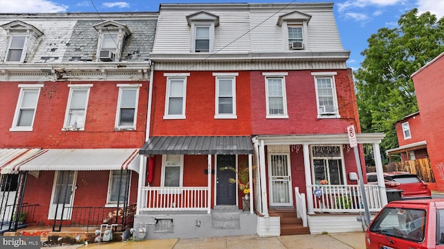 multi unit property featuring covered porch