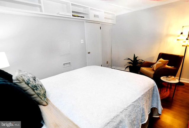 bedroom featuring hardwood / wood-style flooring