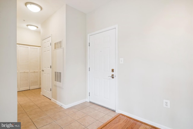 view of tiled foyer entrance