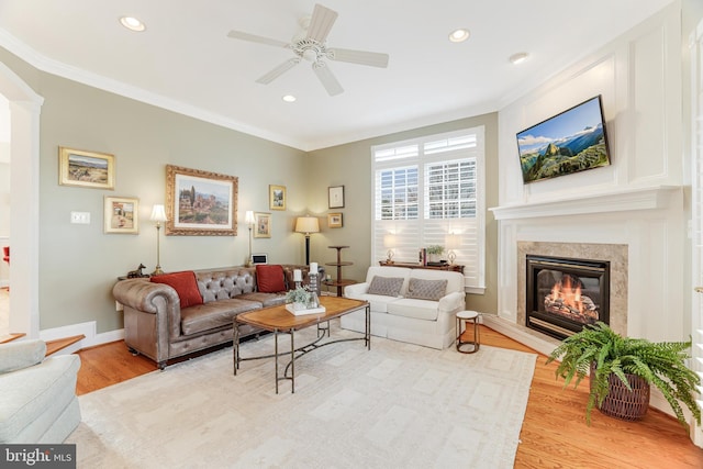 10002 Woodrow St, Vienna, VA 22181 - living room with crown molding, ceiling fan, wood finished floors, and a premium fireplace