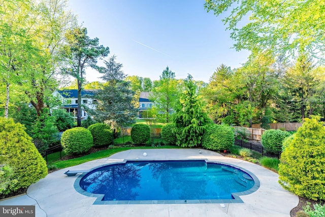 view of pool with fence and a fenced in pool
