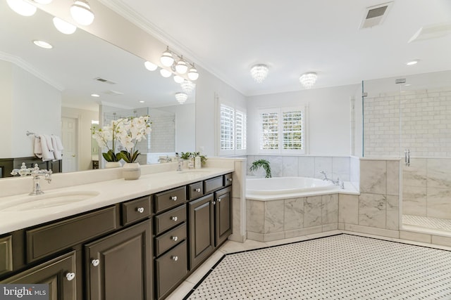 full bathroom featuring crown molding, a sink, visible vents, a bath, and a stall shower