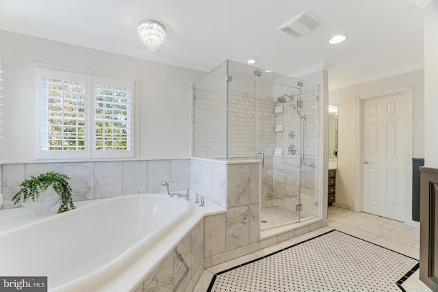 bathroom featuring a garden tub, crown molding, vanity, visible vents, and a shower stall