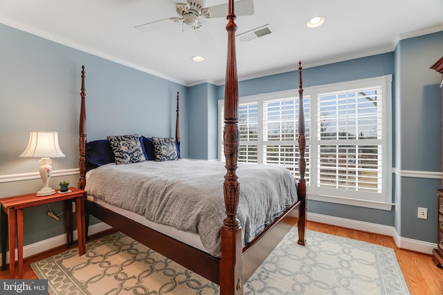 bedroom featuring visible vents, ornamental molding, baseboards, and recessed lighting