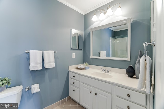 bathroom with crown molding, a shower, tile patterned floors, vanity, and toilet