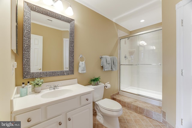 full bathroom with crown molding, vanity, toilet, tile patterned floors, and a stall shower