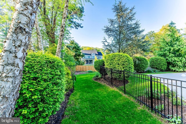 view of yard with fence