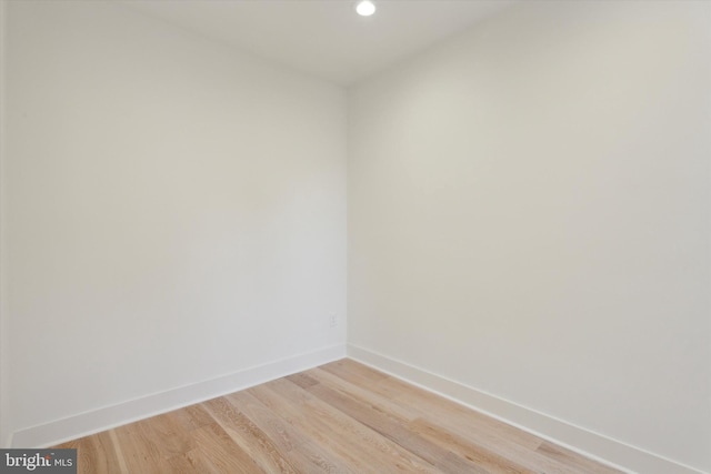 spare room featuring light hardwood / wood-style floors