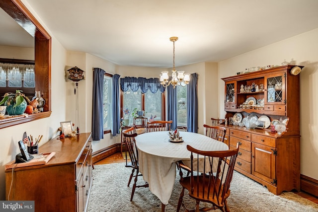 dining room featuring a notable chandelier