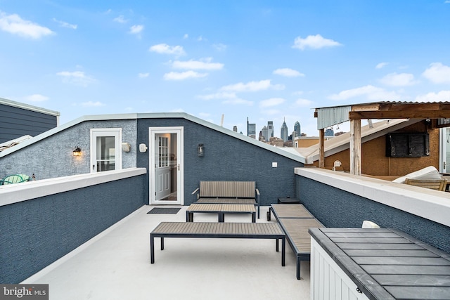 view of patio / terrace with a balcony