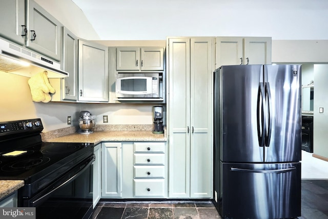 kitchen with appliances with stainless steel finishes and gray cabinetry