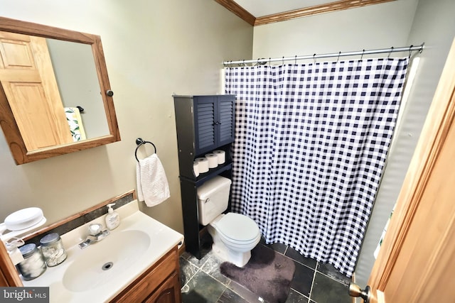 bathroom featuring tile patterned flooring, vanity, toilet, crown molding, and a shower with shower curtain