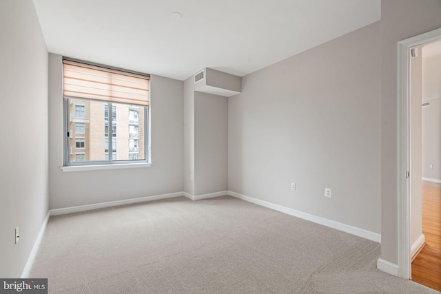 11990 Market St Unit 1311, Reston, VA 20190 - carpeted empty room with baseboards and visible vents