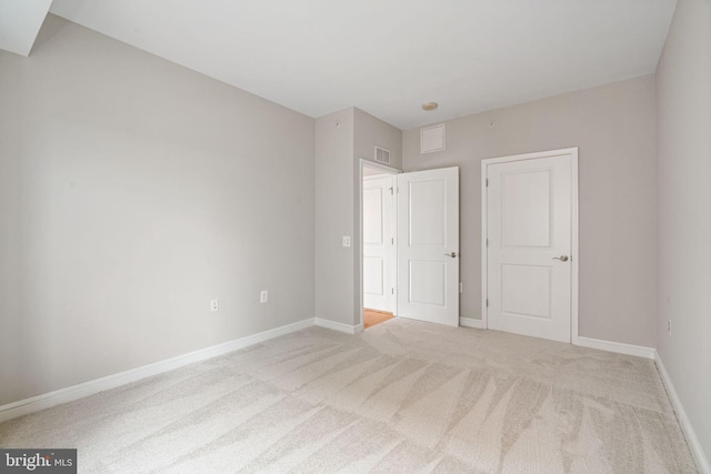 11990 Market St Unit 1311, Reston, VA 20190 - unfurnished bedroom with baseboards, visible vents, and carpet floors