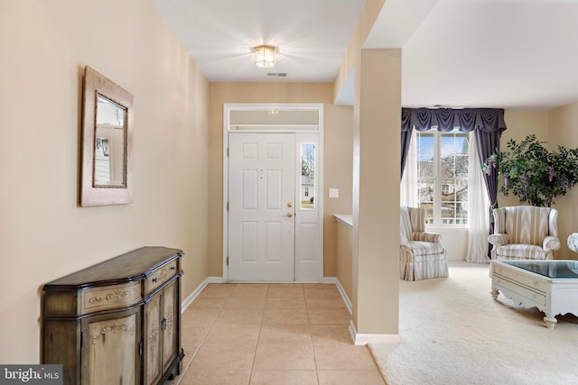 view of tiled foyer entrance