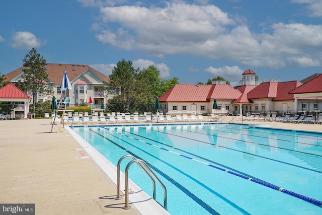 view of swimming pool with a gazebo