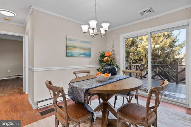 dining room featuring a chandelier, wood-type flooring, a baseboard heating unit, and ornamental molding