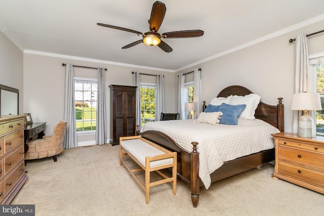 bedroom with ornamental molding, light carpet, and ceiling fan