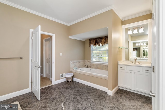 bathroom with ornamental molding, a tub, and vanity