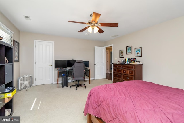 carpeted bedroom featuring ceiling fan