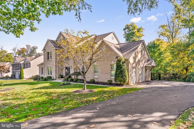 view of front of property with a front lawn