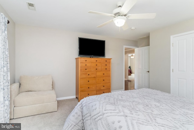 bedroom with light colored carpet and ceiling fan