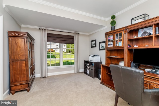 carpeted home office featuring crown molding