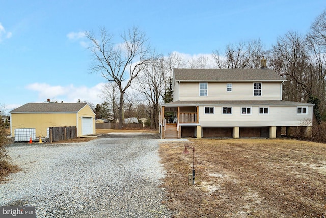 exterior space with a garage and covered porch