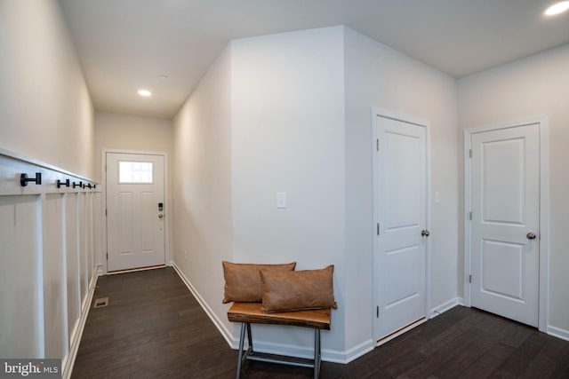 doorway to outside with dark hardwood / wood-style flooring