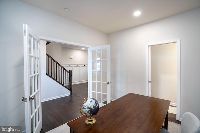 office space with dark hardwood / wood-style floors, french doors, and baseboard heating