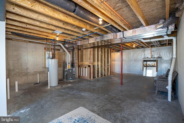 basement featuring gas water heater and heating unit