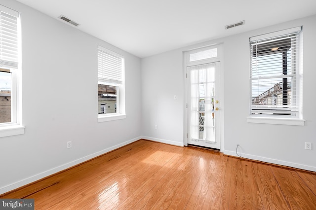 3100 E Lombard St, Baltimore, MD 21224 - unfurnished room featuring baseboards and light wood finished floors