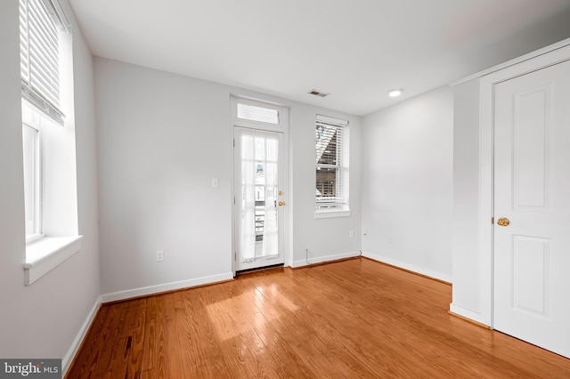 3100 E Lombard St, Baltimore, MD 21224 - entryway featuring wood finished floors, baseboards, and recessed lighting