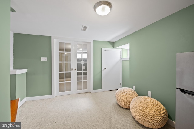 3100 E Lombard St, Baltimore, MD 21224 - recreation room with baseboards and carpet