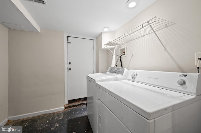 3100 E Lombard St, Baltimore, MD 21224 - washroom featuring washer and dryer and baseboards