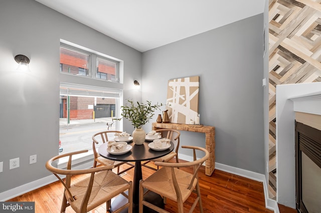3100 E Lombard St, Baltimore, MD 21224 - dining room featuring wood finished floors and baseboards
