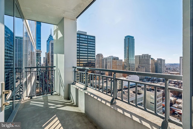 balcony featuring a city view