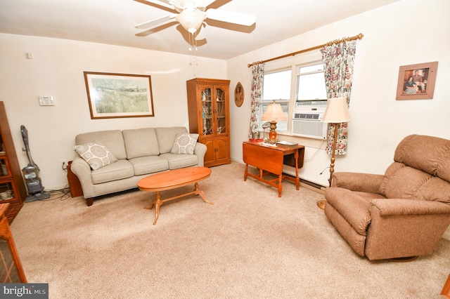 living room with cooling unit, carpet floors, and ceiling fan